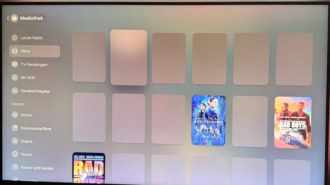 The Apple TV media library with most cover tiles blank